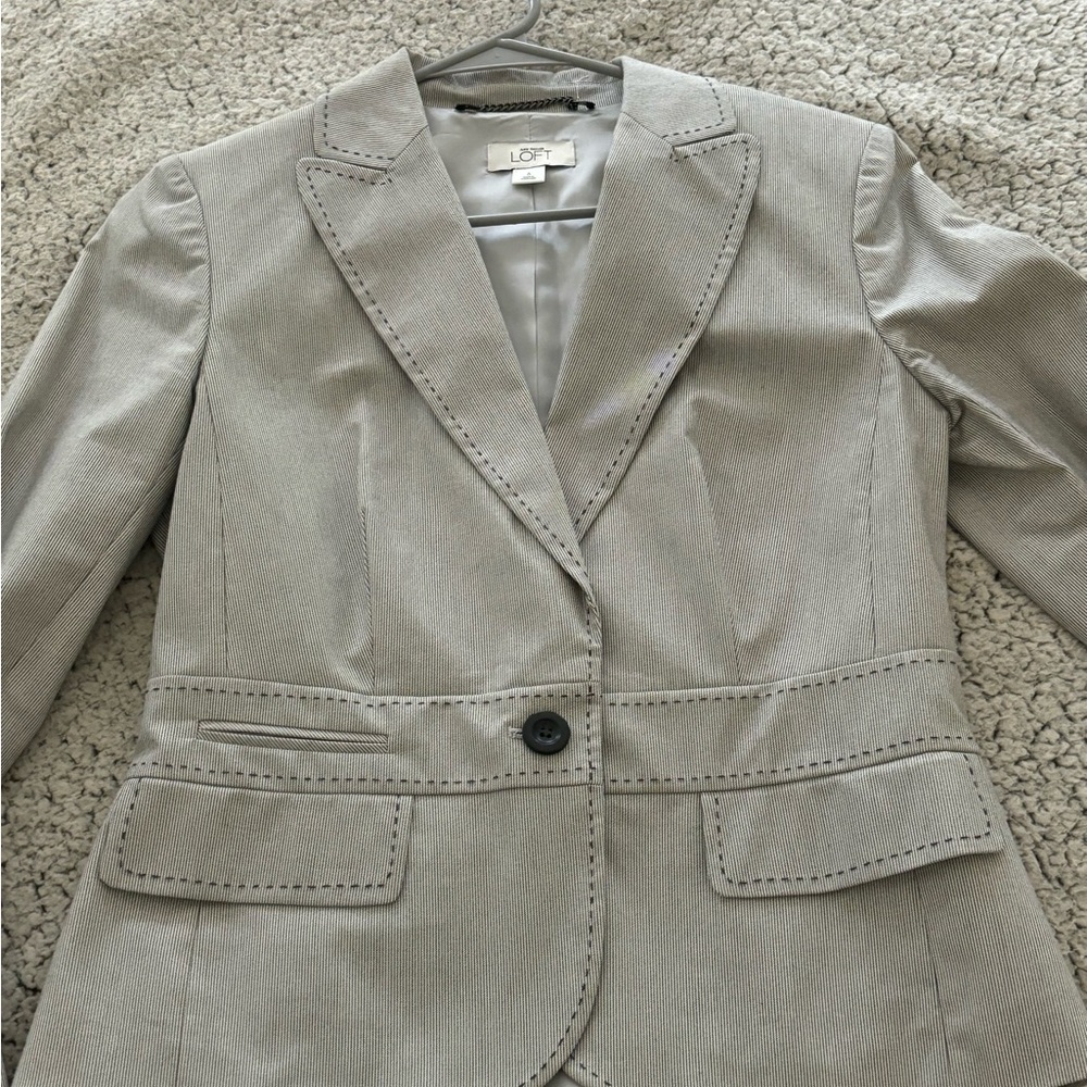 Woman’s pinstripe blazer
